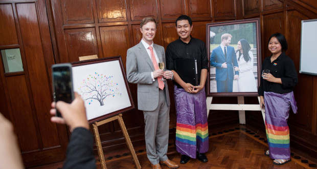Britain’s Deputy Ambassador David Hall poses for a photo with members of the &PROUD LGBT Choir at the British Ambassador’s residence in Yangon. Aung Khant:The Myanmar Times